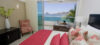 Suites Las Flores Be...